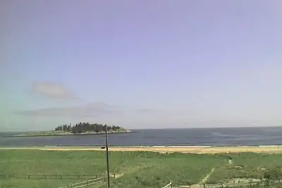 Image de Spectaculaire Ocean Beach et court de tennis