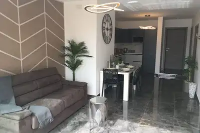 Penthouse moderne à 2 minutes de la mer, dans le centre de Bugibba (barbecue + climatisation / Wifi gratuit)