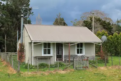 Image de Cottage rustique des années 1800 situé dans une ferme ovine et bovine
