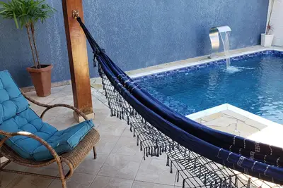 Image de Maison de plain-pied située dans une communauté fermée faisant face à la plage de Massaguaçu.