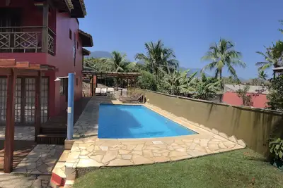 Image de Maison avec 5 suites près de la plage, piscine, terrain de volley, salle de jeux