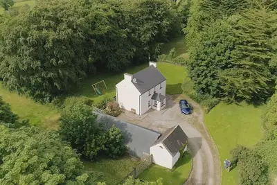 Image de Détendez-vous dans une ferme traditionnelle chalet idéal pour visiter l'Irlande du Sud et de l'Ouest.