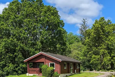Image de Élégant, confortable et accueillante reburbished traditionnel Log Cabin Dans le parc national