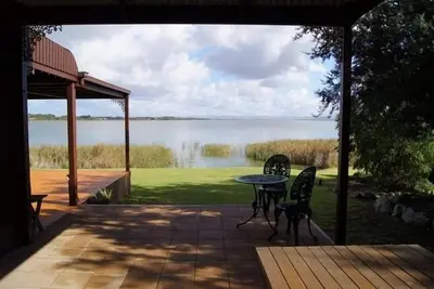 Image de Sunset Cottage. . . Front de mer absolu avec de belles vues sur le coucher du soleil