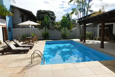 Image de Beach House avec 04 suites climatisées, bar américain, piscine, sauna, barbecue