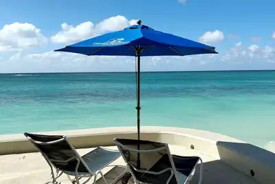 Image de Renos achevé pour ce front de mer sur la plage Seven Mile Cayman Reef Resort # 32