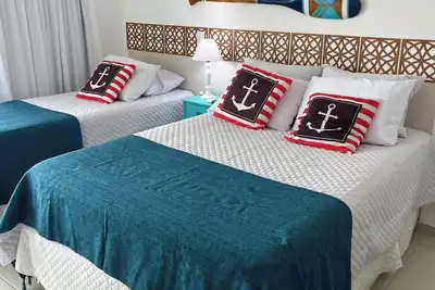 Image de Belle Ape 1 chambre / piscine / grand espace de loisirs / Wi-Fi / gar / avant de Praia Grande