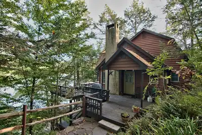 Image de Chalet au bord du lac avec Wifi, climatisation et jouets aquatiques