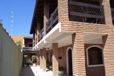 Image de Belle maison de ville avec piscine à 100 m de la plage, pour 14 personnes