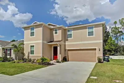 Image de Maison de piscine 8br rentable! Près de Disney, SeaWorld et Convention Center