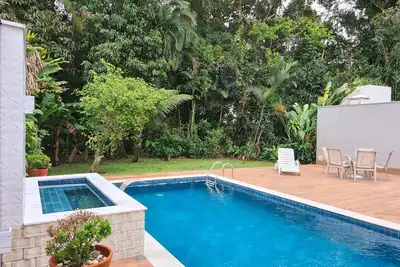 Image de Maison à Riviera, bel espace vert, 04 suites, piscine, barbecue à 600 mètres de la plage