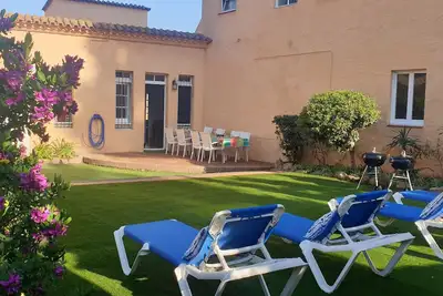 Image de Maison avec jardin, à 30 m. de la plage de sable de la Fosca.