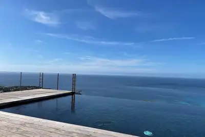 Image de Villa 130m2, vue pano à 180° sur mer, 5 pers. piscine à débordement chauffée