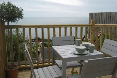 Image de Titha's Cottage - Entièrement rénové avec de belles vues sur la mer