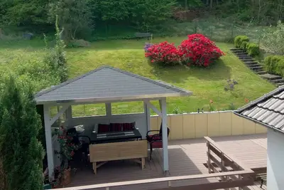 Image de Maison de vacances avec grande terrasse dans le Weserbergland - Sauna