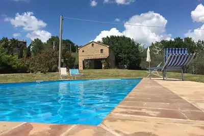 Image de Ferme en pierre avec piscine privée
