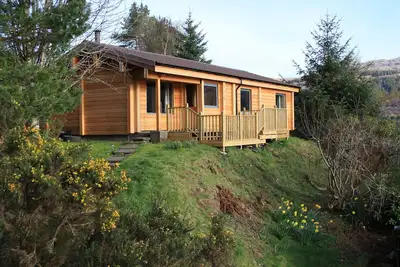 Image de Beautiful Log Cabin dans un endroit magnifique avec Mountain and Loch Views