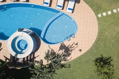 Image de Lilium Villa! Intimité totale, jacuzzi extérieur, près de la plage et des magasins!