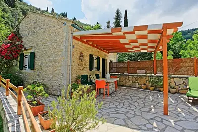 Image de Korina's Cottage: Tranquille maison en pierre, Ă quelques pas de la plage d'Agni