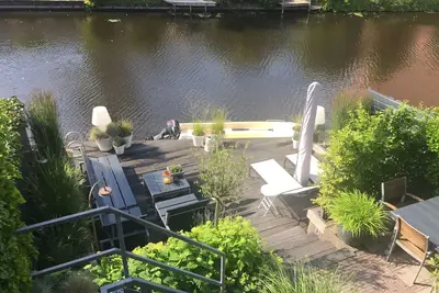 Image de Belle Riverside Studio incl vélos et un parking
