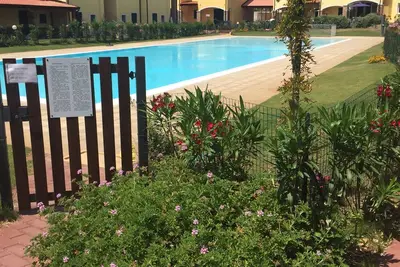 Image de directement sur la mer appartement neuf avec jardin et piscine