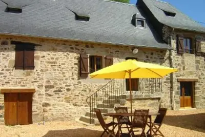 Image de Gite avec cheminée/chambres climatisées/cour et jardin clôturés/animaux acceptés