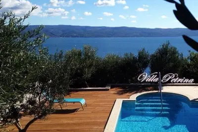 Image de Villa directement en bord de mer (170 m), vue panoramique, piscine chauffée avec hydromassage, salle de gym