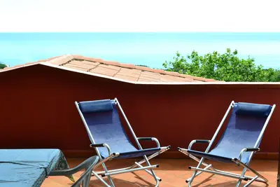 Image de Les maisons de Nina - Grande terrasse avec vue sur la mer