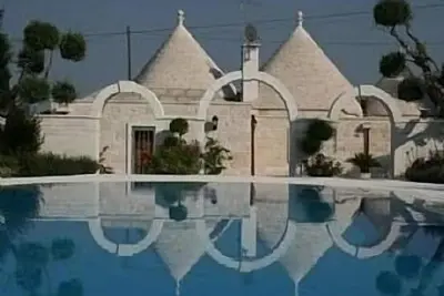 Image de Trullo Villa avec piscine privée, de beaux jardins, dans un cadre charmant