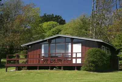 Image de Un endroit isolé Charmante vous attend, Niché dans une vallée pittoresque Petit