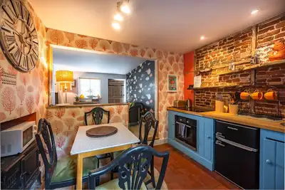 Image de Dolphin Cottage est une belle vieille maison de pêcheur récemment rénovée