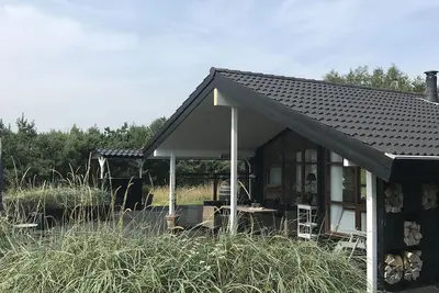 Image de Charmante petite maison près de la belle plage