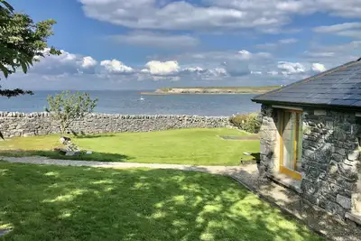 Image de Superbe Cottage Familial Avec Jardin En Bord De Mer