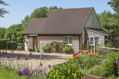 Image de Heron’s Nest, belle maison de vacances de style lodge avec jardin privé près de Royal Woo
