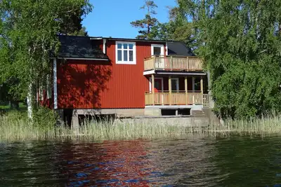 Image de Maison avec le lac Innaren comme voisin le plus proche