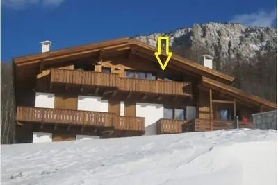Image de un refuge chaleureux dans les dolomites avec une vue imprenable