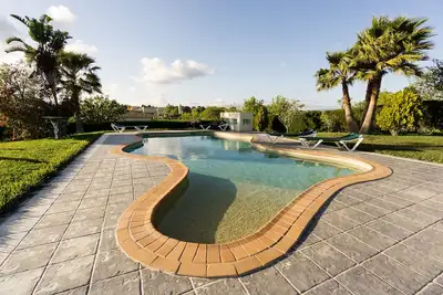 Image de Maisons de vacances jeudi avec vignes et piscine collective près de la plage de Praia da Luz