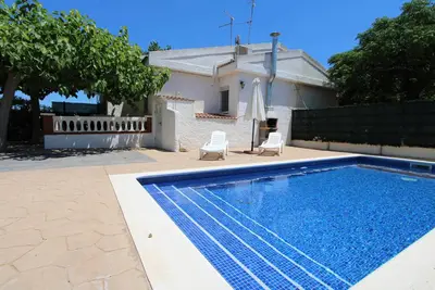 Image de Casa Palmeres 4, Idéal pour vos vacances, proche de la mer, wifi gratuit, air climatisé en option, piscine privée, animeaux de compagnie autorisés, plage pour chiens