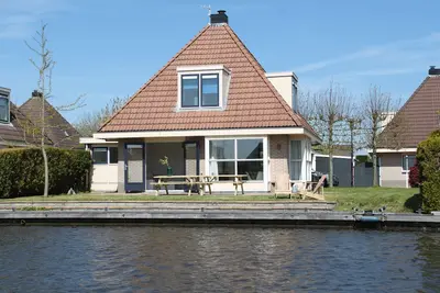 Image de Woudsend: Maison familiale de luxe pour 8 personnes. sur l'eau!