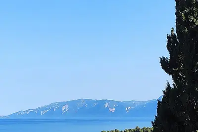 Image de Appartement calme et confortable avec vue sur le golfe et la montagne-Wifi