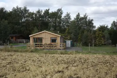 Image de Spacieuse cabine familiale pour 7 personnes, vue rurale ouverte, bien en retrait de la route
