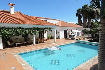 Image de Beautiful home, heated pool, Sea and Mountain views in a tranquil garden setting