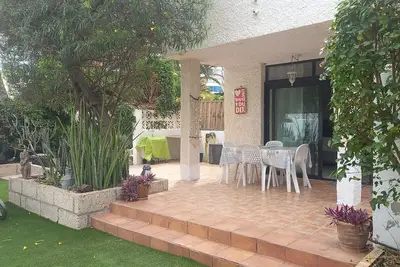 Holiday home with private garden and terrace near the beach