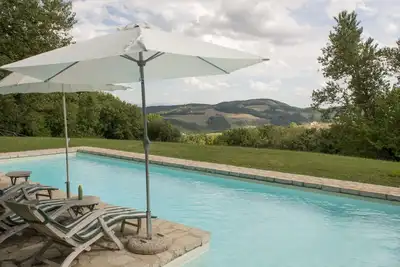 Image de Ferme rustique en pierre avec piscine privée