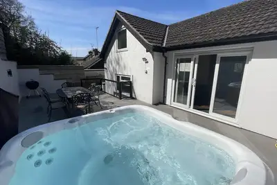Image de Propriété de 3 chambres avec Jacuzzi