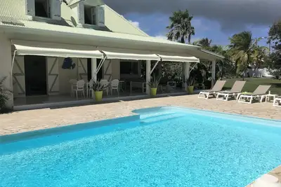 Image de Maison Créole jardin 2000 M2 à 3 minutes de la Plage des Raisins Clairs