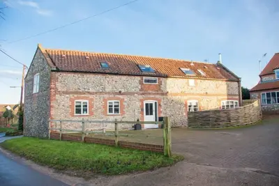 Image de La Coach House est une ancienne Coach House, joliment présentée et élégante.