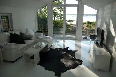 Image de Maison de luxe avec sa propre plage sur le lac Möckeln à Älmhult, coucher de soleil, pêche, sauna