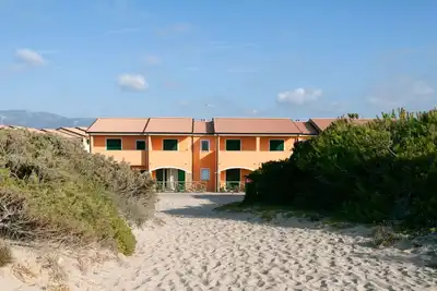 Image de Village Baia delle Mimose, zone Anfiteatro degli Oleandri, face à la mer