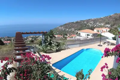 Image de Abreu Villa Une belle maison avec piscine, Wifi et A Wonderful Ocean View